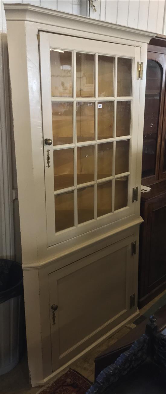 Pair of painted glazed  standing corner cupboards